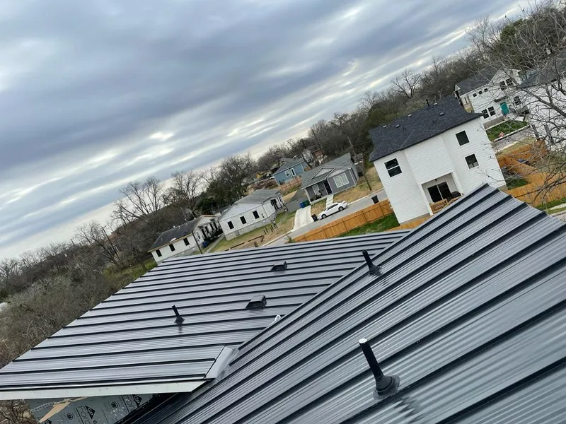 Standing seam metal roof panels with vents for Skylight Repair in Hopkinton